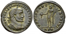 Galerius Maximianus, 305-311 Follis Heraclea circa 305-306, Æ 29mm., 9.98g. Laureate head r. Rev. Genius standing l., with modius on head and naked bu...