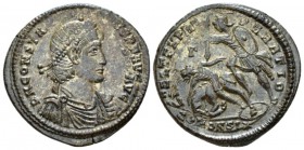 Constantius II, 337-361 Follis Constantinople circa 348-351, Æ 25mm., 5.90g. Pearl-diademed, draped and cuirassed bust r. Rev. Soldier standing l., sp...