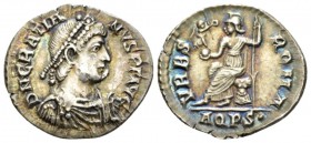 Gratian, 367-383 Reduced siliqua Aquileia circa 375-378, AR 19mm., 2.14g. Pearl-diademed, draped and cuirassed bust r. Rev. Roma seated l. holding rev...