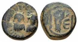 Justin I and Justinian I, 527. Pentanummium Antiochia circa 527, Æ 11mm., 2.13g. Diademed, draped, and cuirassed busts of Justin and Justinian facing....