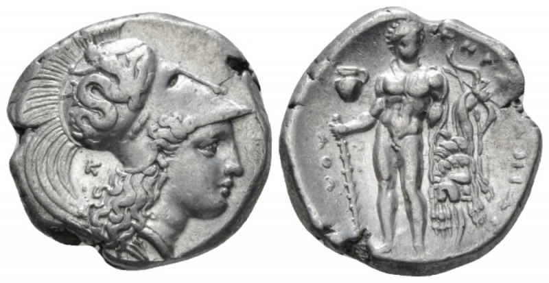 Lucania, Heraklea Nomos circa 330-320, AR 21mm., 7.83g. Head of Athena r., weari...