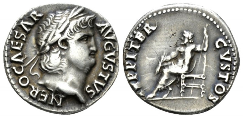 Nero, 54-68 Denarius circa 64-65, AR 18mm., 3.49g. Laureate head r. Rev. Jupiter...