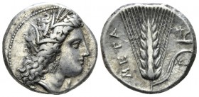 Lucania, Metapontum Nomos circa 330-290, AR 22mm., 7.74g. Head of Demeter r., wearing grain wreath and triple-pendant earring; below chin, ΔAI. Rev. B...
