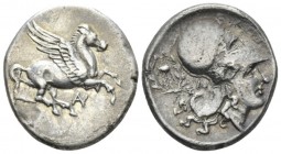 Acarnania, Anactorium Stater circa 350-330, AR 23mm., 8.13g. Pegasus flying r., Rev. Helmeted head of Athena r.; in l. field, tripod. Calciati, Pegasi...
