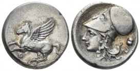 Acarnania, Tyrrhenium Stater circa 350-250, AR 22mm., 8.39g. Pegasus flying l., Rev. Helmeted head of Athena l.; in r. field, Beotian shield. Calciati...