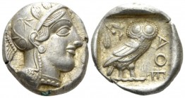 Attica, Athens Tetradrachm after 449, AR 26mm., 17.21g. Head of Athena r., wearing Attic helmet decorated with olive leaves and palmette. Rev. Owl sta...