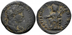 Arabia, Petra Hadrian, 117-138 Bronze circa 117-138, Æ 25.6mm., 12.70g. Laureate, draped and cuirassed bust r. Rev. Tyche seated l. on rocks, extendin...