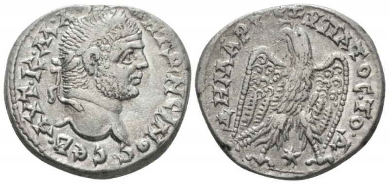 Caracalla, 198-217 Tetradrachm Laodicea circa 215-217, AR 25mm., 12.29g. Laureat...