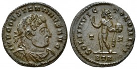 Constantine I, 307-337 Follis Treviri circa 313-315, Æ 20mm., 3.08g. Laureate, draped and cuirassed bust r. Rev. Sol standing l., raising r. hand and ...