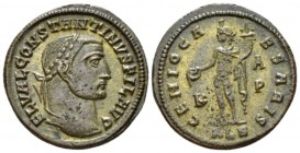 Constantine I as Filius Augustorum. Follis Alexandria late 308-310, Æ 24mm., 6.08g. FL VAL CONSTANTINVS FIL AVG Laureate head r. Rev. GENIO CAESARIS G...