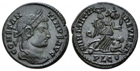 Constantine I, 307-337 Follis Lugdunum circa 323-324, Æ 18mm., 2.68g. Laureate head r. Rev. Victory walking r., holding trophy and a palm branch, spur...