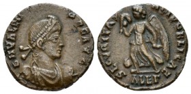 Valentinian II, 375-392 Æ3 Alexandria circa 383-384, Æ 15mm., 2.51g. Helmeted, pearl-diademed, draped and cuirassed bust r., holding spear and shield....