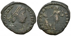 Magnus Maximus, 383-388 Follis Treveri circa 383-388, Æ 25mm., 4.07g. Pearl-diademed, draped, and cuirassed bust r. Rev. Magnus Maximus standing l., r...