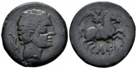 Hispania, Celse Bronze circa 133-100, Æ 29mm., 14.36g. Male head r.; three dolphins around. Rev. Horseman riding r., holding palm frond. CNH 11. SNG B...