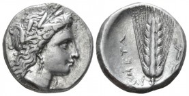 Lucania, Metapontum Nomos circa 330-290 BC, AR 20mm., 7.82g. Head of Demeter r., wearing grain ear wreath and triple-pendent earring. Rev. Barley ear,...