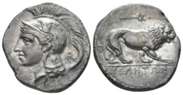Lucania, Velia Nomos circa 280, AR 23mm., 7.25g. Head of Athena l.; wearing crested helmet decorated with griffin. Rev. Lion crouching r.; above, cadu...