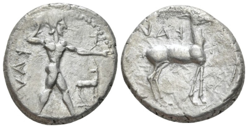 Bruttium, Caulonia Nomos circa 475-425, AR 22mm., 7.91g. Apollo, diademed, walki...