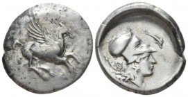 Illyricum, Dyrrhachium Stater circa 400-330 BC,, AR 25mm., 8.33g. Pegasus flying r.; below, Δ. Rev. Helmeted head of Athena r.; club and Δ behind, dol...
