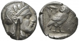 Attica, Athens Tetradrachm circa 420-385, AR 25mm., 17.06g. Head of Athena, wearing crested helmet decorated with olive leaves and spiral palmette. Re...