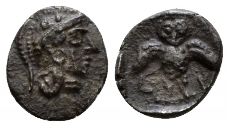 Samaria, Ma'eh / obol mid IV century BC, AR 8.20mm., 0.71g. Helmeted head of Ath...