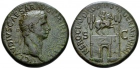 Claudius, 41-54 Sestertius circa 50-54, Æ 35mm., 27.77g. Laureate head r. Rev. Triumphal arch surmounted by equestrian statue r. between two trophies....