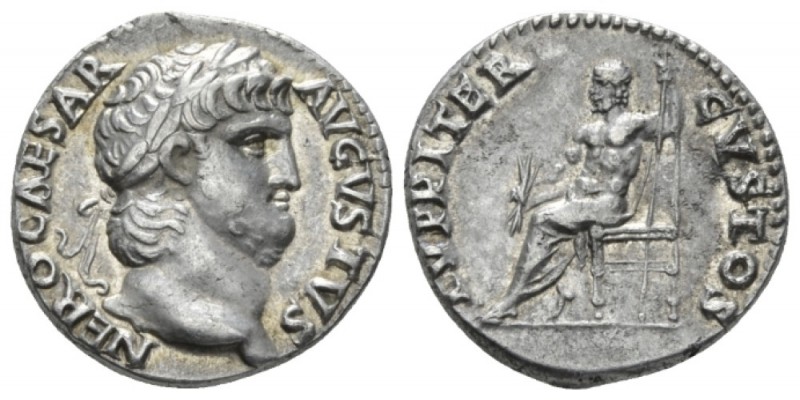 Nero, 54-68 Denarius circa 64-65, AR 18mm., 3.34g. Laureate head r. Rev. Jupiter...