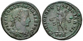 Constantine I Caesar, 305-307. Follis Treveri circa, Æ 27.6mm., 11.19g. Laureate head r. Rev. Genius standing l., holding patera and cornucopia; in fi...