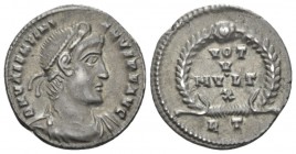 Valentinian I, 364-375 Siliqua circa 364-367, AR 18mm., 2.06g. Pearl-diademed, draped and cuirassed bust r. Rev. VOT / V / MVLT X within wreath; in ex...
