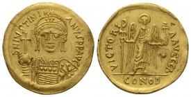 Justinian I, 527 – 565. Solidus Rome circa 545-565, AV 20mm., 4.47g. Helmeted, pearl-diademed and cuirassed bust three-quarters facing, holding globus...