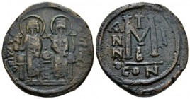 Justin II, with Sophia. 565-578. Follis circa 565-566, Æ 30mm., 14-94g. Justin, holding globus cruciger, and Sophia, holding cruciform sceptre, seated...