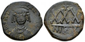 Tiberius II Constantine, 578-582 3/4 Follis – 30 Nummi Nicomedia circa 578-579, Æ 30mm., 13.16g. Crowned, draped, and cuirassed facing bust. Rev. Larg...