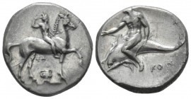 Calabria, Tarentum Nomos circa 302, AR 20mm., 7.70g. Horseman r. crowning himself; between horse’s legs, ΣA / Ionic capital. Rev. Oecist riding dolphi...