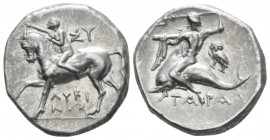 Calabria, Tarentum Nomos circa 272-240, AR 20mm., 6.45g. Youth on horseback l., crowning horse and holding rein. Rev. Oecist, preparing to throw tride...