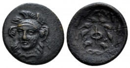 Phocis, Federal Coinage Bronze under Phalaikos, 351 BC, Æ 15mm., 2.05g. Head and neck of Athena helmeted facing ¾ left. Rev. Φ in laurel wreath with b...