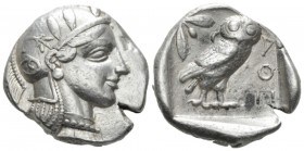 Attica, Athens Tetradrachm last half of 450's, AR 25.3mm., 17.14g. Head of Athena r., wearing Attic helmet decorated with olive wreath and palmettae. ...