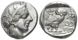 Attica, Athens Tetradrachm after 449, AR 25mm., 16.44g. Head of Athena r., wearing crested Attic helmet decorated with three olive leaves and a spiral...