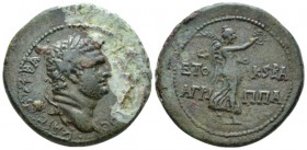 Judaea, Caesarea Paneas Titus as Caesar, 69-79 Bronze circa 75-76, Æ 29.6mm., 13.51g. Laureate head r. Rev. Nike standing r., holding wreath and palm ...