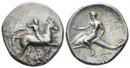 Calabria, Tarentum Nomos circa 322-302, AR 23mm., 7.54g. Youth on horseback r., crowning himself; below capital. Rev. Oecist riding dolphin l.; holdin...