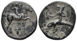 Calabria, Tarentum Nomos circa 280-272, AR 20mm., 6.16g. Youth riding horse r.; crowning himself, below, Ionic capital. Rev. Oecist riding dolphin l.;...