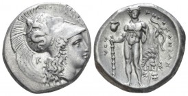 Lucania, Heraclea Nomos circa 300, AR 23mm., 7.78g. Head of Athena r., wearing Corinthian helmet decorated with Skylla; in l. field, K. Rev. Heracles ...