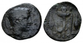Sicily, Leontini Tetras circa 405-402, Æ 14.5mm., 1.76g. ΛEON Laureate head of Apollo r.; at l. laurel leaf. Rev. Tripod; behind lyre; at side two gra...