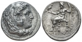 Kingdom of Macedon, Alexander III, 336 – 323 Babylon Tetradrachm circa 323-317, AR 27mm., 16.40g. Head of Herakles r., wearing lion skin. Rev. Zeus se...