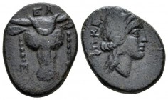 Phocis, Federal coinage. Elateia. Bronze Late IV to early III cent., Æ 20mm., 4.56g. Facing bull’s head with EΛ above. Rev. Wreathed head of Apollo r....
