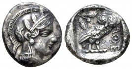 Attica, Athens Drachm circa 454-404, AR 14.9mm., 4.01g. Helmeted head of Athena r., with frontal eye. Rev. Owl standing r., head facing; olive sprig a...