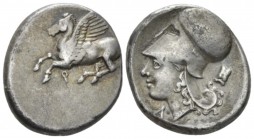 Corinthia, Corinth Stater circa 345-307, AR 21mm., 8.40g. Pegasus flying l. Rev. Helmeted head of Athena l.; in r field, astragalus. Ravel 1039. Calci...