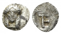 Ionia, Colophon Tetartemorion circa 450-410, AR 8mm., 0.19g. Facing head of Apollo. Rev. Monogram (mark of value) TE within incuse rectangle. Milne, C...