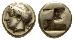 Ionia, Phocaea Hecte circa 477-388, EL 10mm., 2.51g. Female head l., hair caught up in netted saccos tied above forehead; behind, seal. Rev. Quadripar...