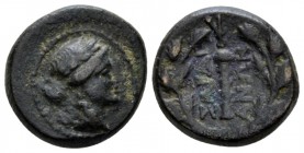 Lydia, Sardes Bronze I cent., Æ 14mm., 4.25g. Laureate head of Apollo R. Rev. Club within wreath; monogram in r. field. SNG von Aulock 3125 (different...