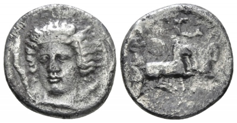 Sicily, Catana Drachm signed by Choirion circa 405, AR 16mm., 3.96g. Head of you...