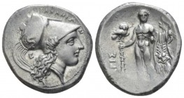 Lucania, Heraklea Nomos circa 281-278, AR 22mm., 7.73g. Helmeted head of Athena r., bowl decorated with Scylla hurling stone; behind neck-guard, E. Re...
